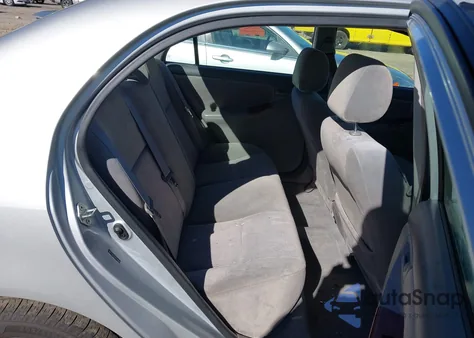 2005 Toyota Corolla Le z USA, uszkodzony, nr VIN 2T1BR30E85C398664